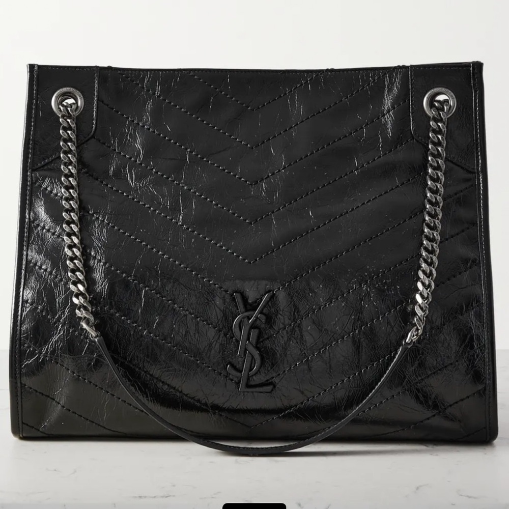 Black YSL tote with black metal detailing.